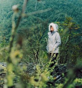 Waterproof rain shell jacket worn outdoors